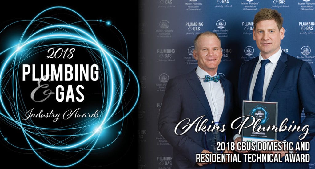 Two men accepting an award for the 2018 Plumbing and Gas Industry Awards | Akins Plumbing.