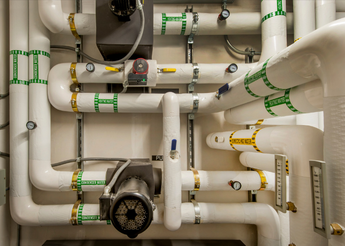 Modern industrial plumbing pipes | Featured image for Plumber Rocklea.