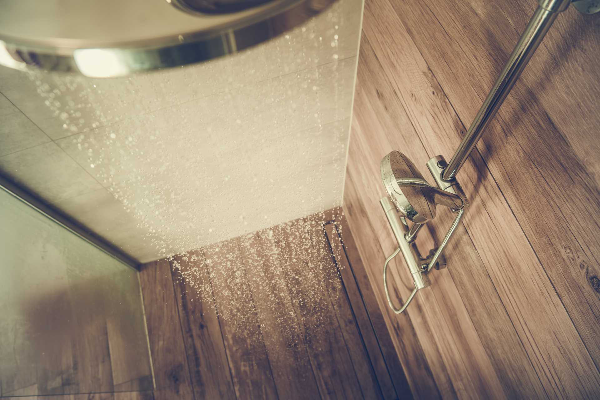 Shower with hot water running | Featured image for What is the Ideal Hot Water Temperature blog by Akins Plumbing.